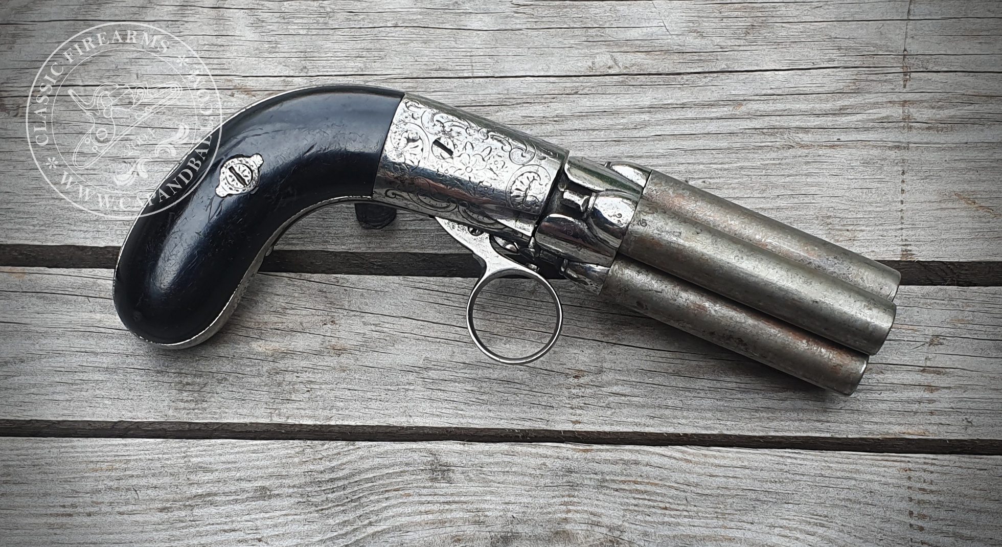 A Mariette pepperbox revolver